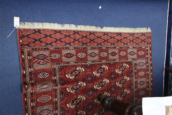 A Bokhara rug, 6ft 1in by 4ft 6in.